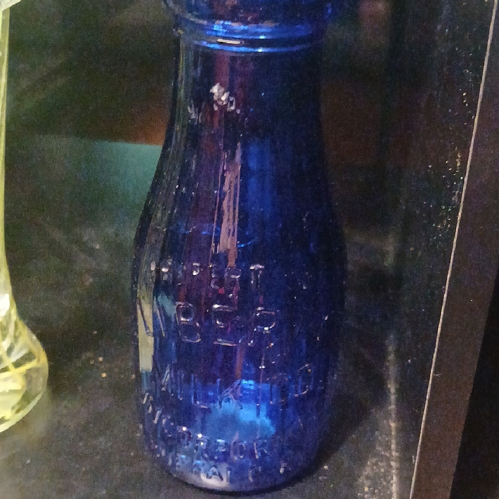 Blue Glass Art Vase Milk Bottle Liberty Milk Compony
